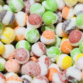 A close up image of Yum Yum Candy Shop's sour rainbow krunchies
